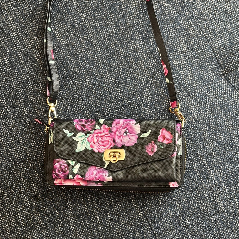 Floral Black Crossbody Bag with magnetic cell phone cover (iPhone 15Plus).